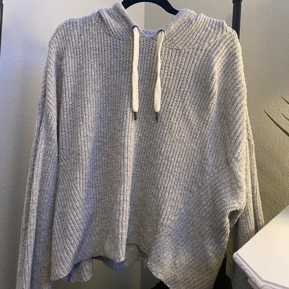 grey sweater with hood and tie